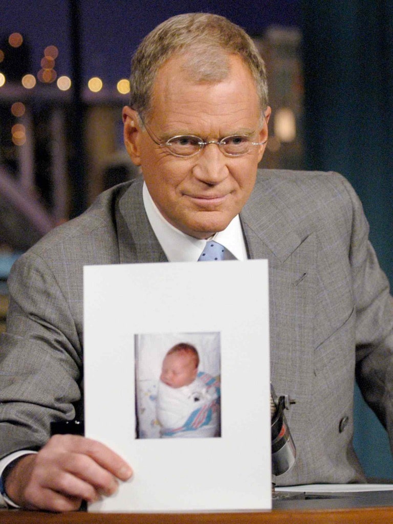 david letterman holds a photo of his son harry joseph letterman during late show with david Letterman